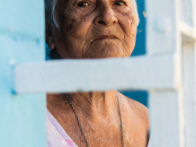 Woman watching through her window